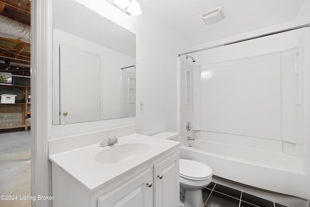 full bathroom with tile patterned flooring, vanity, toilet, and  shower combination