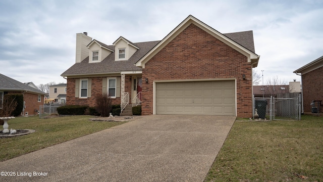 view of front of home with a garage and a front lawn