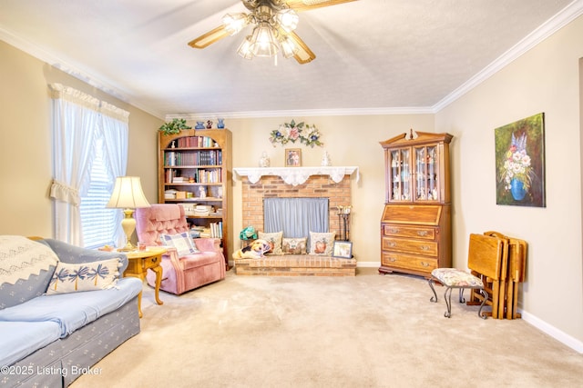 sitting room featuring ornamental molding, carpet, ceiling fan, and a brick fireplace