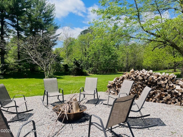 view of patio featuring a fire pit