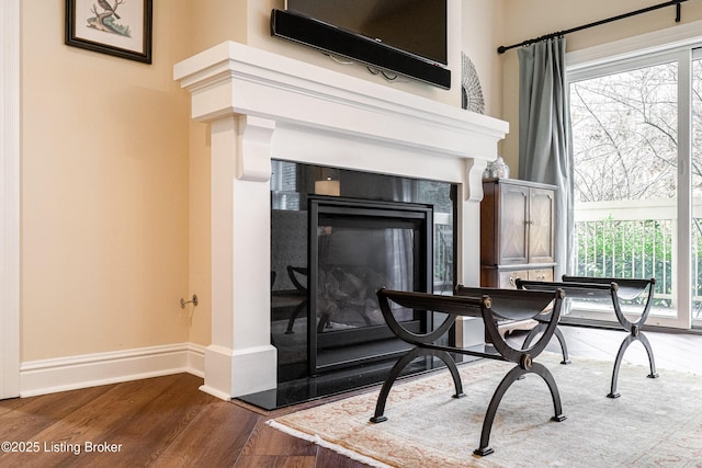 living area featuring hardwood / wood-style floors