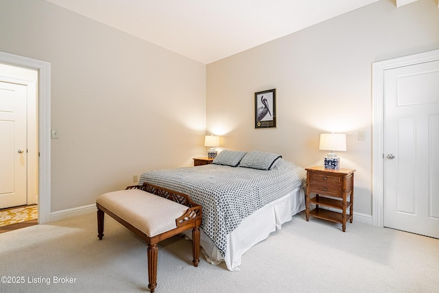 bedroom with light carpet