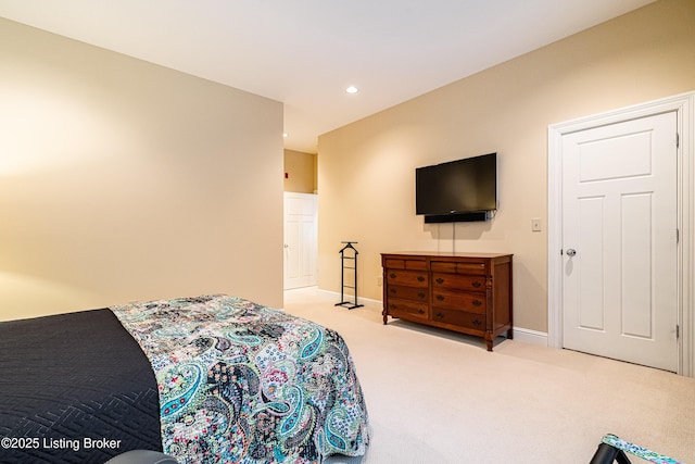 bedroom with light colored carpet