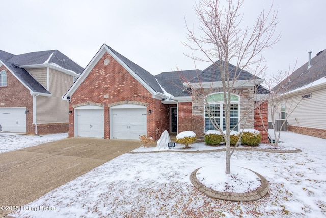 ranch-style house featuring brick siding, a shingled roof, driveway, and a garage