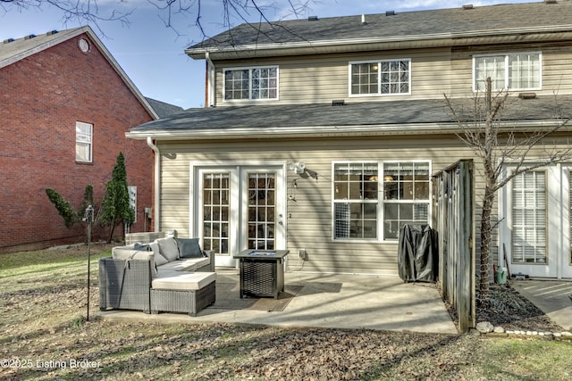 back of house with outdoor lounge area and a patio