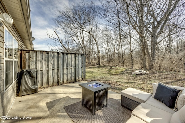 view of patio / terrace with grilling area and an outdoor fire pit