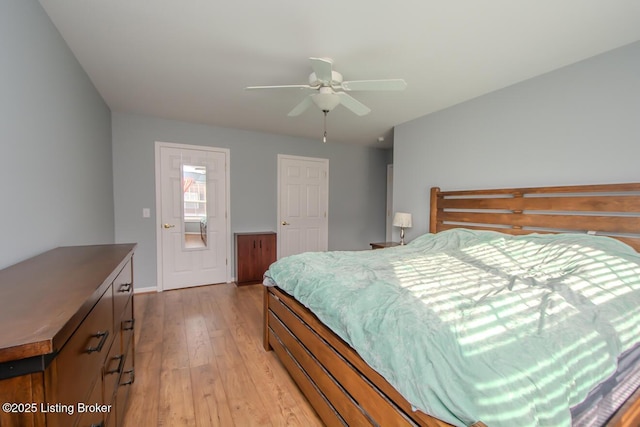 bedroom featuring ceiling fan and light wood-type flooring