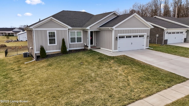 view of front of house featuring a garage and a front yard