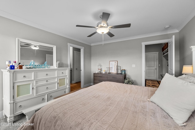 bedroom featuring ceiling fan and ornamental molding