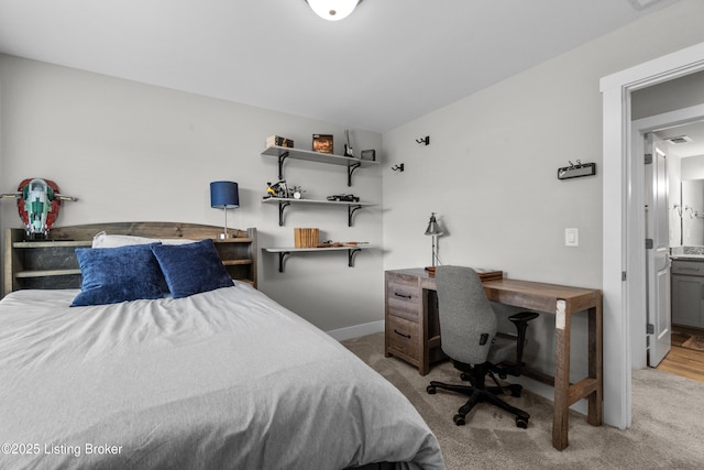 bedroom with light colored carpet