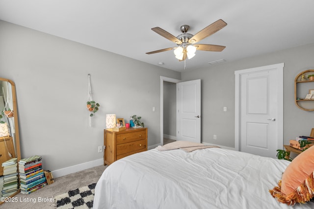 carpeted bedroom featuring ceiling fan