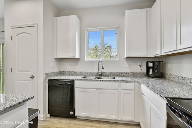 kitchen with sink, white cabinetry, light hardwood / wood-style flooring, dishwasher, and light stone countertops