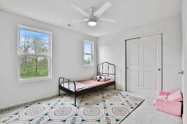 bedroom with a closet and ceiling fan