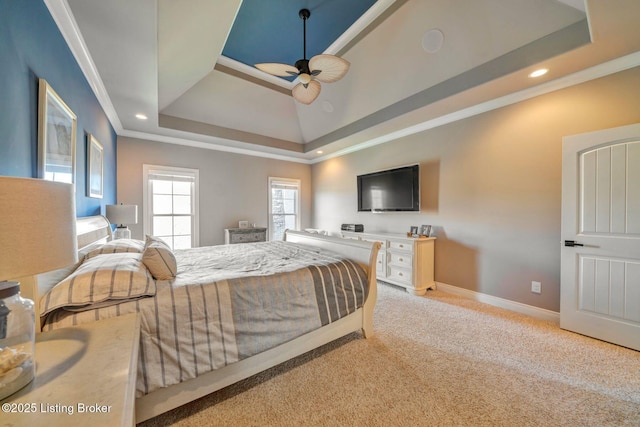 bedroom featuring baseboards, recessed lighting, crown molding, a raised ceiling, and light colored carpet