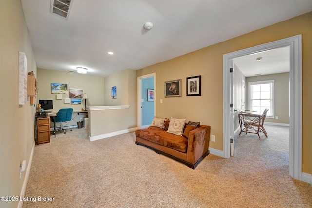 living area featuring recessed lighting, carpet, visible vents, and baseboards