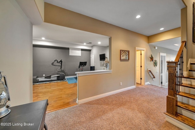 interior space featuring recessed lighting, carpet, and baseboards