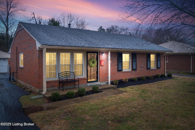 view of front of home featuring a yard