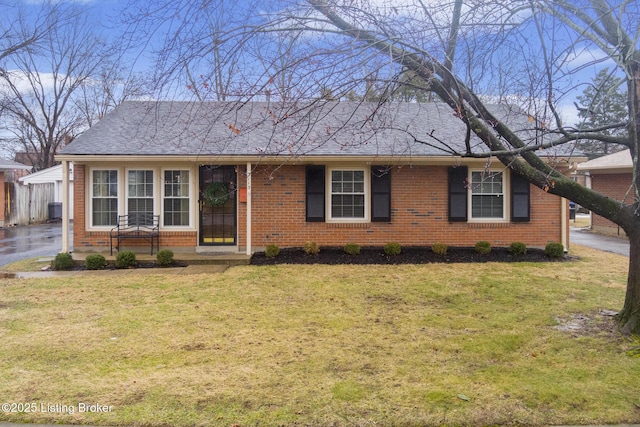 ranch-style house with a front yard