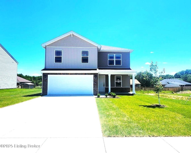 300 Tristan Ln, Elizabethtown, KY 42701 - view of front of house with covered porch, concrete driveway, and a garage