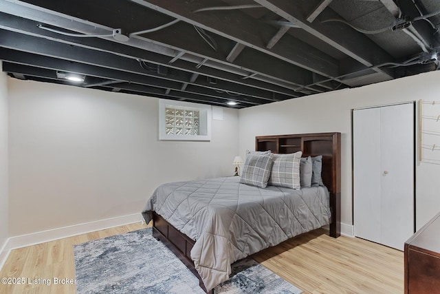 bedroom with hardwood / wood-style floors