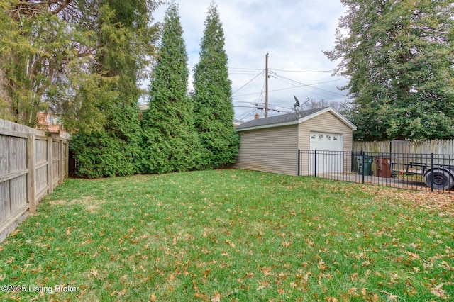 view of yard featuring an outbuilding and a garage