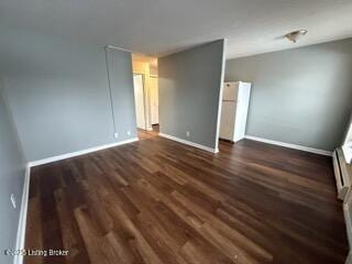 unfurnished bedroom with dark wood-type flooring