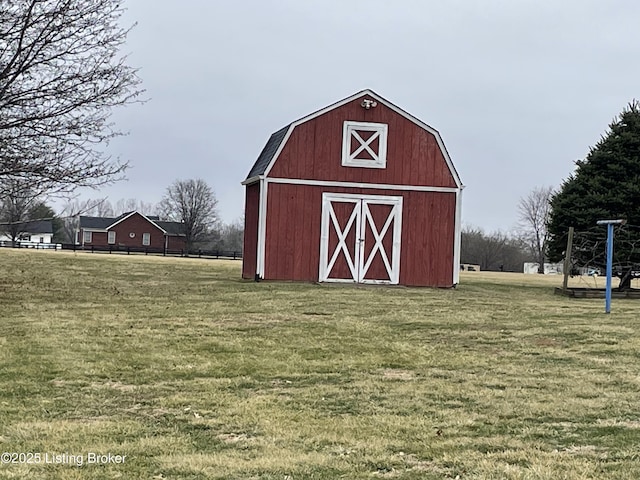 view of outdoor structure with a lawn