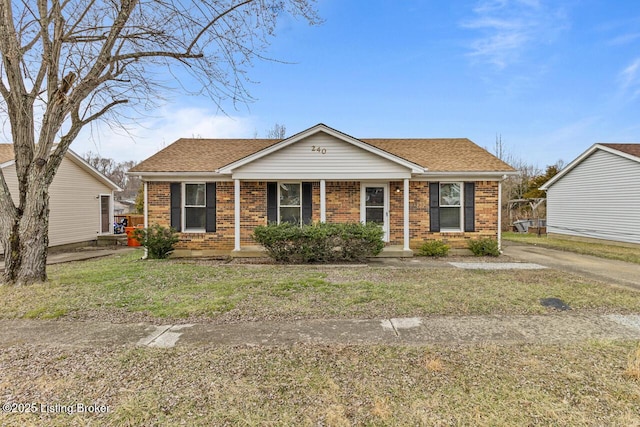 bungalow-style home featuring a front lawn