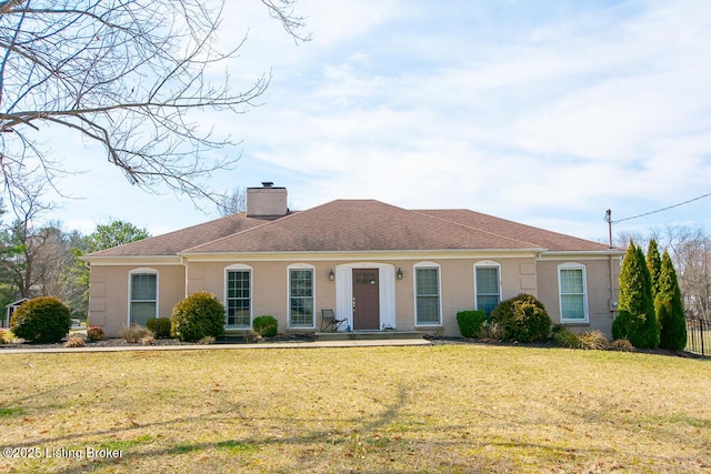 view of front facade with a front yard