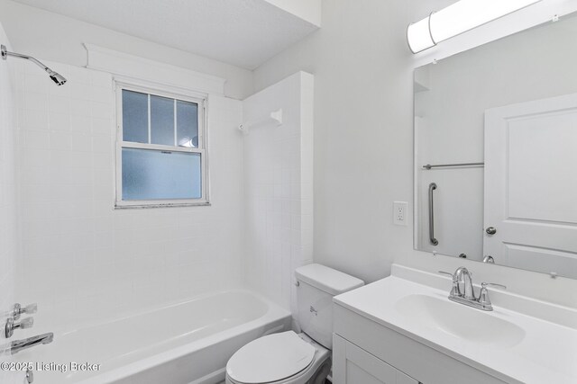 4145 W Muhammad Ali Blvd, Louisville, KY 40212 - full bathroom featuring vanity, toilet, and tiled shower / bath