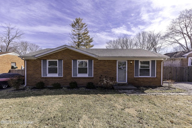 single story home with a front yard