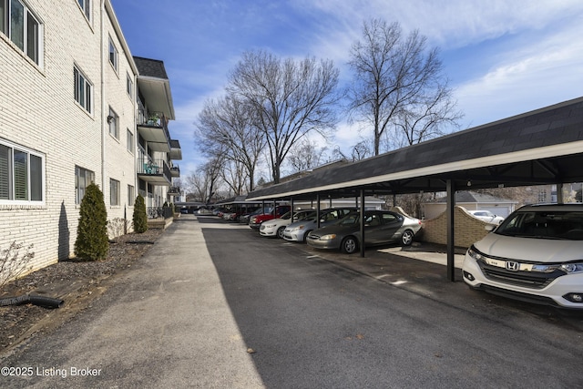 view of car parking with a carport