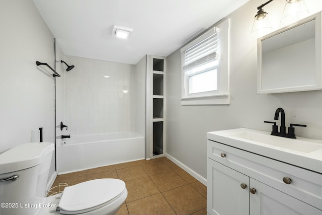 bathroom with bathtub / shower combination, toilet, vanity, tile patterned flooring, and baseboards