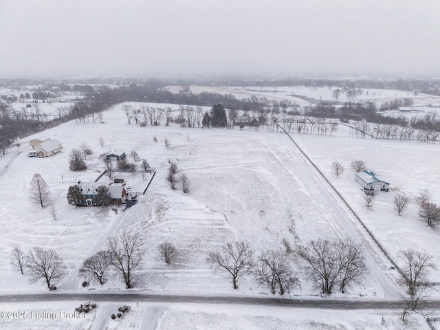 snowy aerial view with a rural view