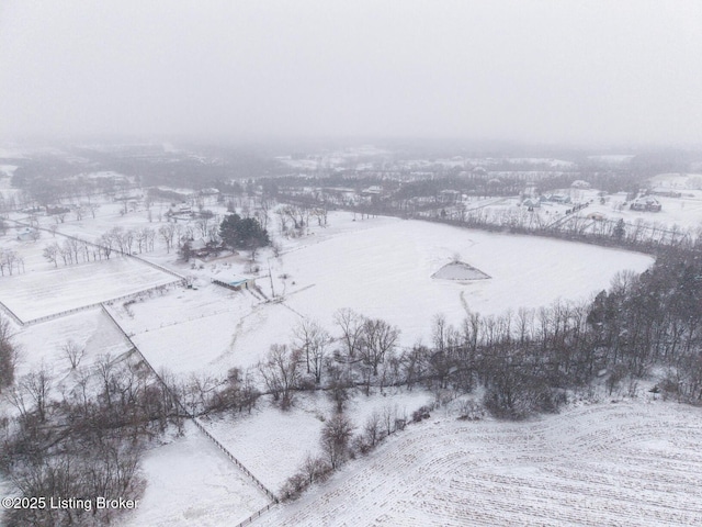 snowy aerial view with a rural view