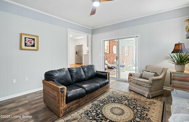 living room with crown molding, hardwood / wood-style floors, and ceiling fan