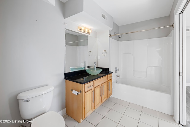 bathroom featuring visible vents, toilet, bathing tub / shower combination, tile patterned floors, and vanity