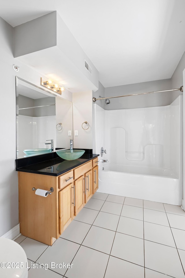 full bath with visible vents, toilet, tile patterned flooring, bathtub / shower combination, and vanity