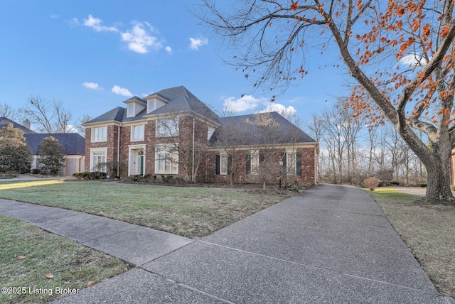 view of front of home with a front lawn