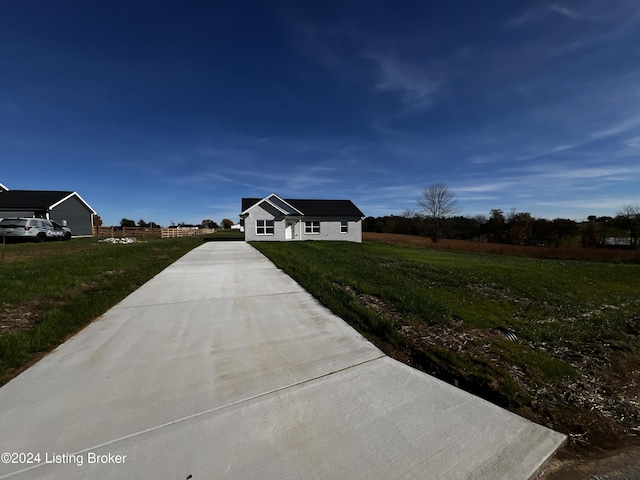 view of front of home with a front lawn