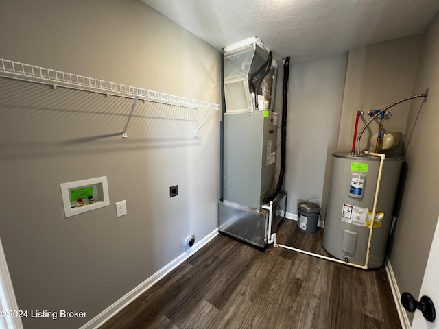 laundry area with washer hookup, electric water heater, dark hardwood / wood-style floors, and electric dryer hookup