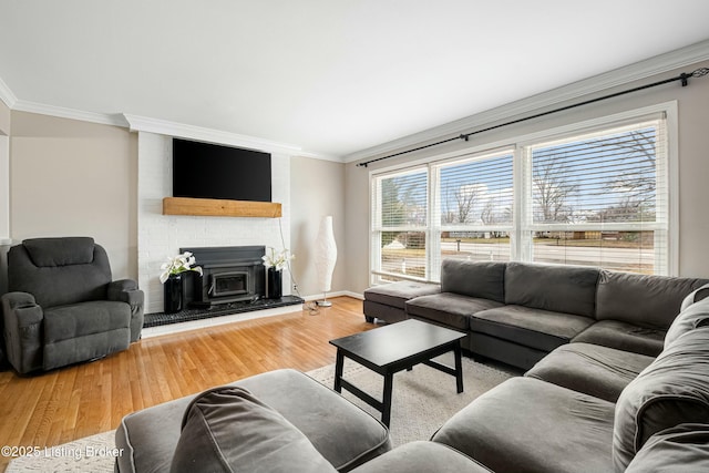 living room featuring crown molding and wood-type flooring