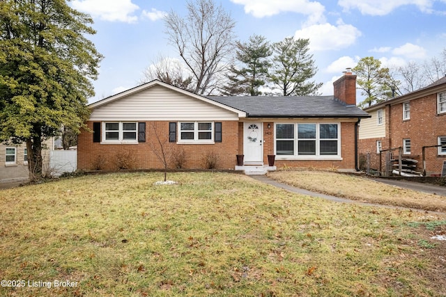 single story home with a front lawn