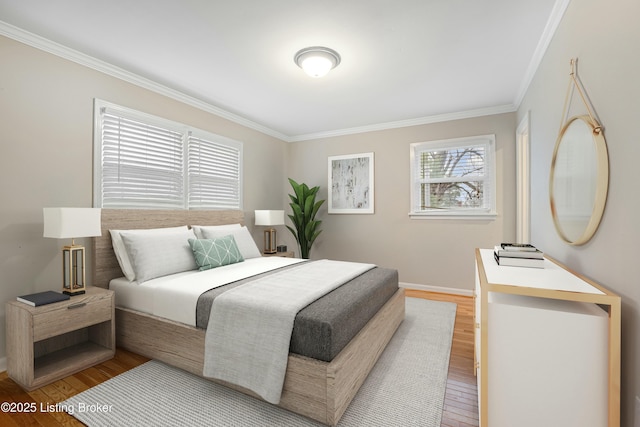 bedroom with crown molding and wood-type flooring