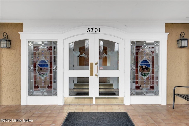 doorway to property featuring french doors