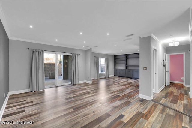 unfurnished living room with wood-type flooring and ornamental molding