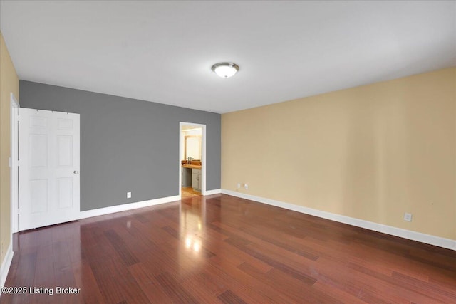 unfurnished room featuring hardwood / wood-style floors