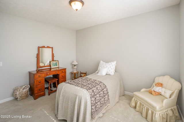 bedroom with light carpet