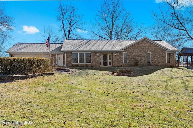 view of front of property with a gazebo and a front yard