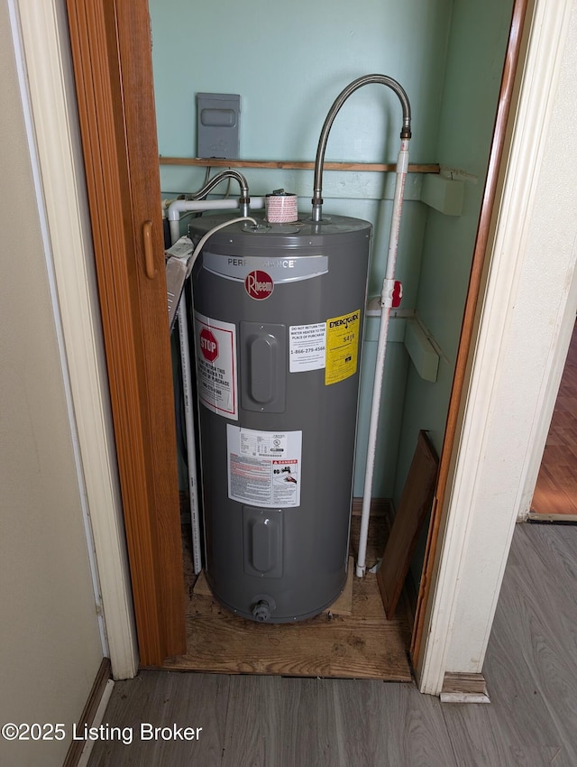 utility room with water heater